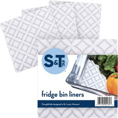 three white placemats with an image of fruit and vegetables on the top one