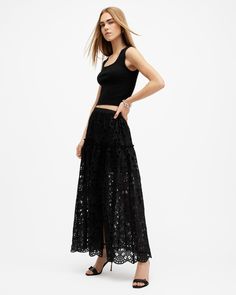 Broderie is our thing. The Rosie Skirt doesn't spare on going all out. The midi-length silhouette features a a full straight hem with slight frill. We've also added an easy side split to create a shape that just flows. This midi skirt looks great paired with tees or bodysuits - try one of our iconic bikers, it's always a finishing touch.  This skirt is designed to a regular fit Pullover Broderie detailing Petite frill Straight hem Side split Full hem Lined Lightweight Midi Skirt Black, Flower Girl Tutu, Black Midi Skirt, Boys Coat, Sweaters And Jeans, Side Split, Workwear Dress, All Saints, Skirt Black