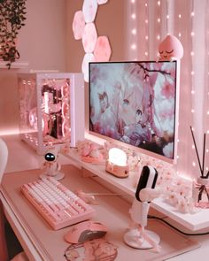 a desktop computer sitting on top of a white desk