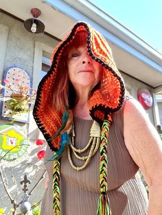 Hand Crochet Hood Unisex Brown/Orange & Green Black trim Free size. Inspired by The Twisted Hatter (her wonderful patterns are on Etsy !) DARE TO BE DIFFERENT ! Bohemian Winter Bonnet, One Size Fits Most, Bohemian Crochet Bonnet One Size, Bohemian Crochet Hat For Beach In Fall, Bohemian Crochet Beach Hat For Fall, Bohemian Multicolor Crochet Hat For Festival, Multicolor Bohemian Crochet Hat For Festivals, Bohemian Adjustable Bonnet For Festivals, Bohemian Summer Bonnet, Adjustable Bohemian Bonnet For Festivals