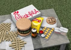 a picnic table with food and snacks on it