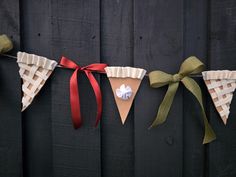 some paper cones are hanging on a string