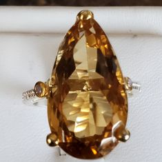 This Ring Grabbed Me From Moment One! So Grand And Timeless. White Topaz Accents. Highlighted In 14k Yellow Gold. Set In 925 Stamped Sterling Silver. Please See All Pictures For Details And Measurement. Brand New. Never Worn. Wholesale Prices Always....Or Less. F23a Formal Teardrop Topaz Rings, Yellow Topaz Ring, Gold Set, Topaz Ring, White Topaz, Womens Jewelry Rings, Topaz, Silver Gold, Ring Size