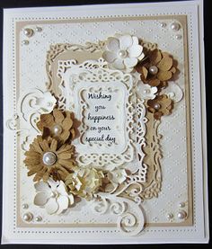 an ornate card with flowers and pearls on the edges, says wishing you happiness to your special day