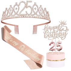 a birthday cake with a tiara on top and two candles in the shape of numbers