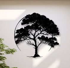 a metal tree is mounted to the wall