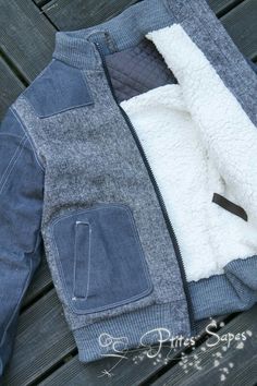 the jacket is made out of an old pair of jeans and has a sherpam coat on it