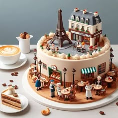 a cake that is sitting on top of a table with coffee and other items around it