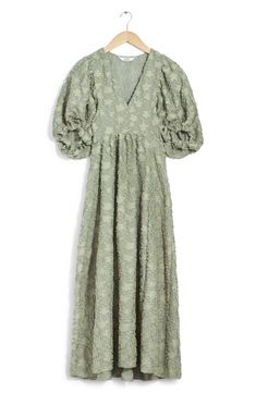 Tonal chenille blooms and generous sleeves add nostalgic romance to this winsome maxi dress rendered in a soft shade. 53" length (size 4) Hidden side-zip closure V-neck Short sleeves with elastic cuffs 100% viscose with 51% polyester, 37% viscose, 12% polyamide contrast Dry clean or machine wash, line dry Imported Formal Modest Dresses, Louis Vuitton Taschen, Summer Style Guide, Expensive Clothes, Soft Autumn, Church Dresses, Fall Clothes, Khaki Dress, Maxi Dress Green