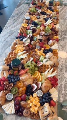 a long table covered in lots of different types of food