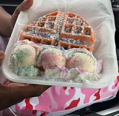 a waffle with sprinkles and ice cream