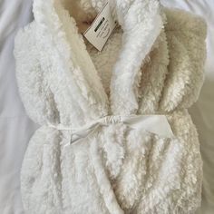 Come In From The Cold Or From Any Long Day At Work And Slip Into Our Faux Fur Robe. Soft, Plush, And Oh-So-Cozy, It Is The Ultimate Bath And Lounging Companion. Made Of 100% Polyester. Yarn-Dyed Fiber Has Incredibly Rich Color That Holds Its Vibrancy Over Time. Oeko-Tex Standard 100: Tested For 1000+ Harmful Substances To Keep You And Your Family Safe. 14.Hus.42449 Hohenstein Htti. Machine Wash In Warm Water; Gentle Cycle. Winter White Sleepwear For Relaxation, White Winter Sleepwear For Relaxation, Cozy White Soft Sleepwear, Fitted White Sleepwear For Winter, In From The Cold, Bachelorette Weekend, Polyester Yarn, Ivory Color, Soft Plush