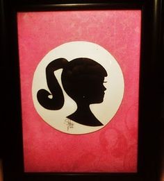 the silhouette of a woman's head is shown in a black and pink frame