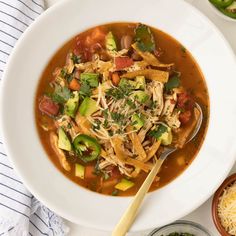 a white bowl filled with chicken tortilla soup