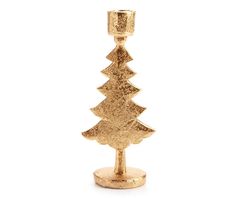 a gold christmas tree candle holder on a white background