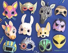 many different masks are arranged on a blue surface