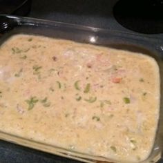 a casserole dish is being prepared on the stove