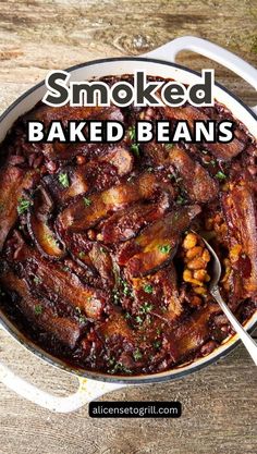 smoked baked beans in a pan with spoon