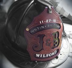 a fireman's helmet with the words, just in britain and wildford on it