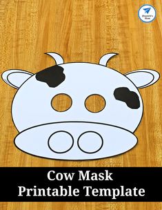 a cow mask is shown on a wooden surface with the words, cow mask printable template