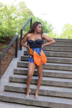 Mini skirts printed in beautiful African fabric along with a big bow to pull off the whole look. Skirt With Bow, Dashiki Dress, Bow Skirt, Ankara Skirt, Kitenge, Cultural Diversity, Diy Sewing Clothes, Big Bow, Bow Design