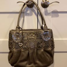 Pewter With Flower And Design Detail With Gathering Sectional Inside Silver Leather Satchel For Shopping, Brighton Purses, Bag Wishlist, Brighton Handbags, Brighton Bags, Straw Handbags, Croc Leather, Brown Shoulder Bag, Black Leather Purse