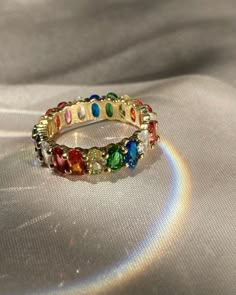 multi color oval eternity crystal band ring high quality 14k gold plated, copper, cubic zirconia Rainbow Rings Engagement, Dope Jewelry Accessories, Life Jewelry, Somewhere Over The Rainbow, Accesories Jewelry, Rainbow Rings, Music Books, Magical Jewelry, Jewelry Accessories Ideas