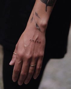 a person with a tattoo on their arm