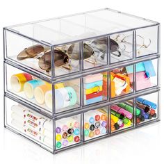 a clear plastic drawer filled with lots of different items