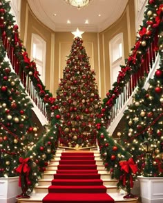 a christmas tree sitting on top of a red carpeted staircase