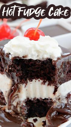 a piece of chocolate cake with ice cream and a cherry on top