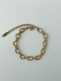 We love this bracelet as a set with our Oval Link Necklace, but this can easily transition into your current everyday stack. This bracelet adds a formal, chic touch to any outfit. 18K gold plating on stainless steel Oversized oval link chain 6.75" chain with 2" extender Water resistant, hypoallergenic Formal Chic, Link Chain Bracelet, Link Necklace, Link Chain, Gold Plating, Chain Bracelet, 18k Gold, Gold Plate, Water Resistant