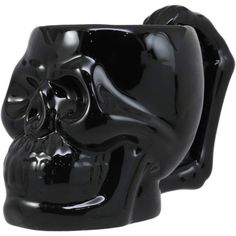 a black skull shaped cup on a white background