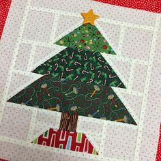 a quilted christmas tree on top of a table