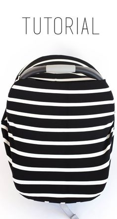 a black and white striped bag sitting on top of a table