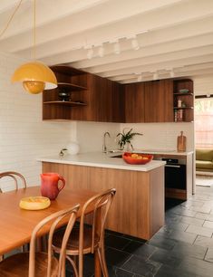 the kitchen is clean and ready to be used as a dining room or living room