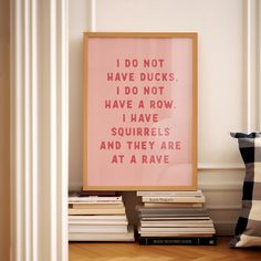 a pink poster with the words i do not have ducks, i do not have a row, i have squirrels and they are at a rave