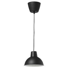 a black and white light hanging from a ceiling