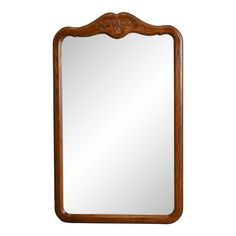 a wooden frame mirror on a white background