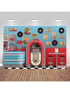 an old fashioned kitchen with retro appliances and record players on the wall, as well as vinyl records