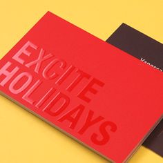 two red and black business cards with the words exotic holidays printed on them next to each other