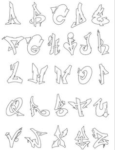 the alphabet and numbers are drawn in black ink on a white paper, which has been placed