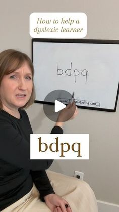 a woman sitting in front of a whiteboard with writing on it and the words blpqp written below