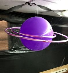 a large purple object hanging from the ceiling