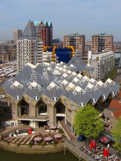 an aerial view of a city with lots of tall buildings