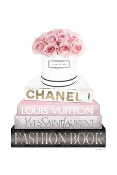 three books stacked on top of each other with pink roses in the middle and chanel logo above them