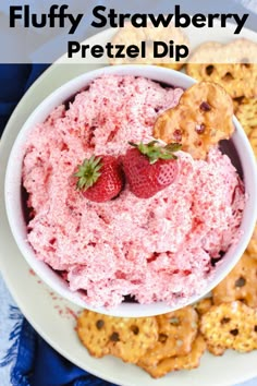 a white bowl filled with strawberry pretzel dip