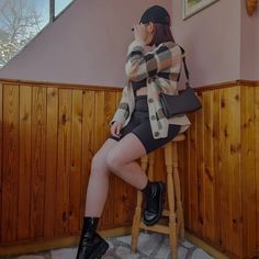 Winter vest, black pants, low boots, black boots, black purse, cap, chair poses, fashion photo ideas, fashion inspiration Winter Vest Outfits, Vest Outfit, Winter Vest, Vest Outfits, Black Pants, Winter Outfits, Fashion Looks