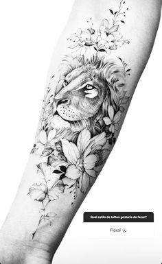 a black and white photo of a lion with flowers on it's arm