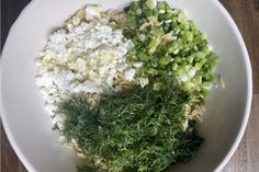 a white bowl filled with different types of food